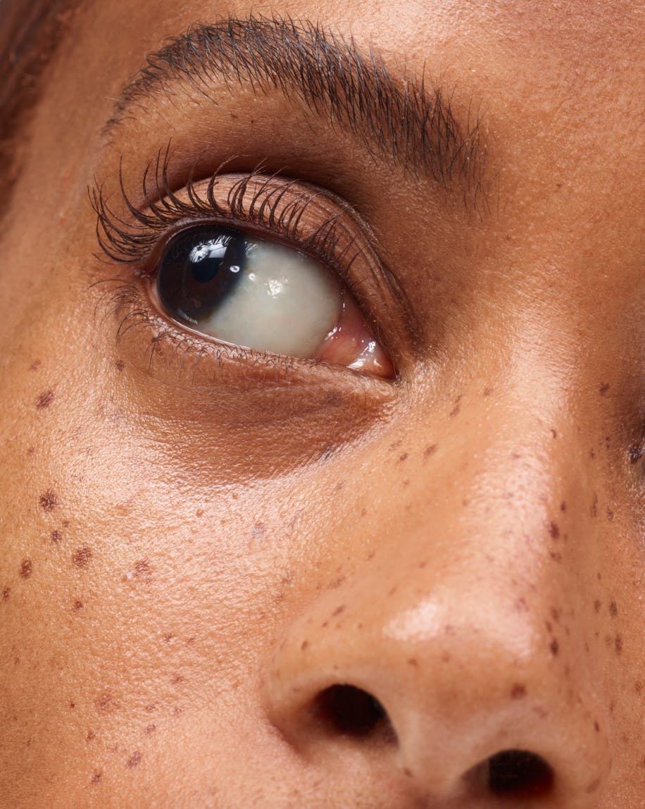 close up of model's eye wearing lash slick brown on eyelashes